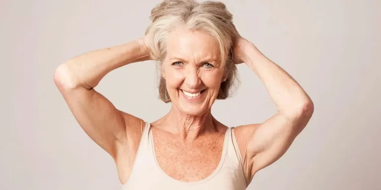 blog - fit senior woman hands on head workout tank top